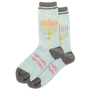 Light blue socks with Menorah design and 'eight nights' text on a white background