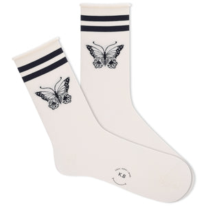 A pair of white roll-top crew socks with a black butterfly and two stripes design at the cuff.