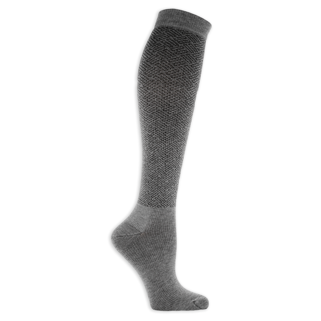 A pair of over-the-calf socks featuring a geometric pin dot pattern.