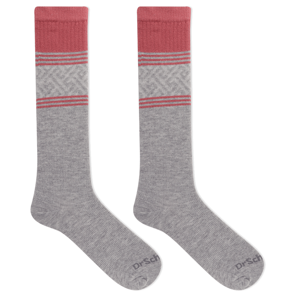 Gray knee-high socks with pink accents on a black background