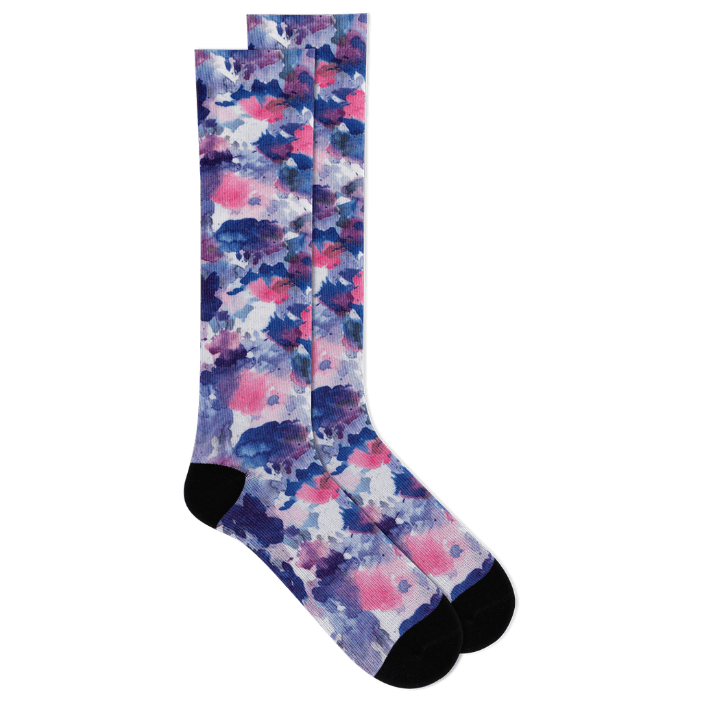 Pair of colorful floral-patterned socks on a black background
