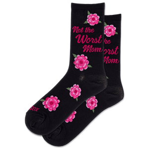 A pair of black crew socks with pink floral prints and the text 'Not the Worst the Mom Worst Mom' in pink script, displayed against a solid white background.