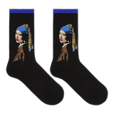 A pair of black crew socks featuring a stylized graphic of Vermeer's Girl with the Pearl Necklace, shown against a plain white background. thumbnail