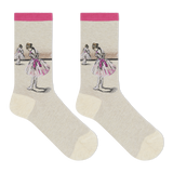 A pair of crew socks with a light beige body, featuring Edgar Degas' "Study of a Dancer" artwork of ballerinas in pink tutus on the upper leg, finished with a bright pink cuff and toe/heel accents.