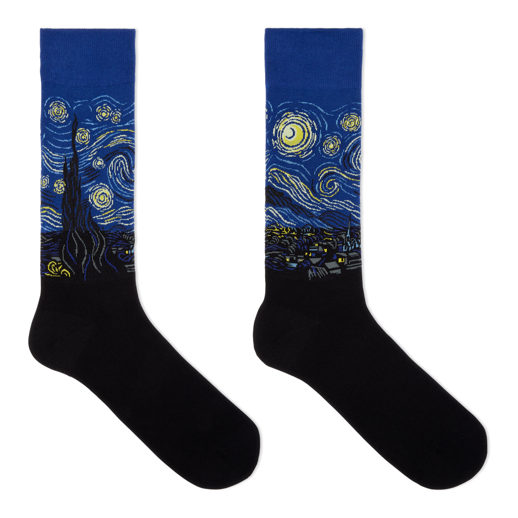 A pair of crew socks featuring a blue and yellow Van Gogh-inspired swirling night sky and cypress tree design on the upper portion, with solid black feet below, shown on a plain white background.