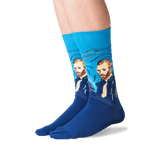 A pair of crew socks worn on a person's feet, featuring a blue background with a printed portrait of Vincent van Gogh in a swirling brushstroke style. The feet are shown against a clean white background. thumbnail