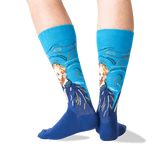 A person's legs wearing blue crew socks with a stylized portrait of Vincent van Gogh in a Van Gogh-inspired swirling composition, shown against a plain white background. thumbnail