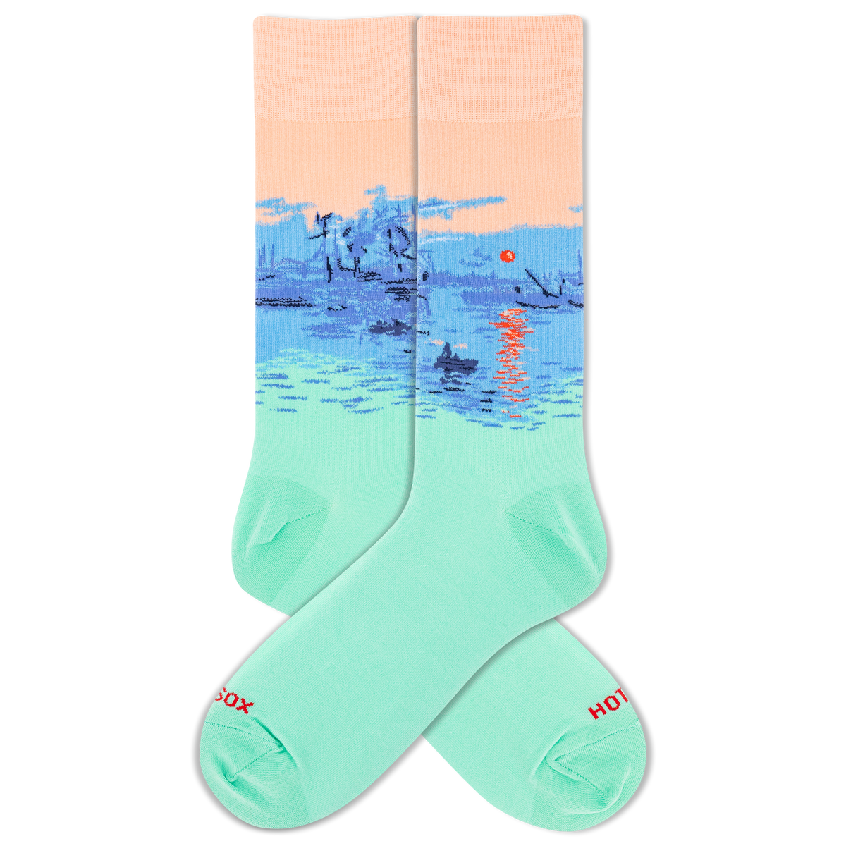 A pair of crew socks with a scenic landscape oh Monet's "Impression, Sunrise" design featuring a peach sky, blue water, and a small red sun, with the lower portion fading into mint green. The toes and heels are solid mint green, and the words 'HOTSOX' are printed in red on the toes.