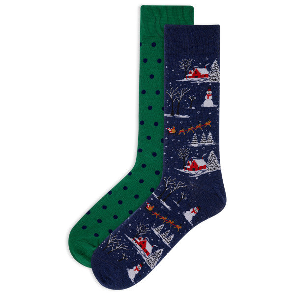 A pair of men's Christmas-themed crew socks with a pattern featuring Santa Claus, reindeer, and snowmen on a navy background, and a solid green pair with polka dots.