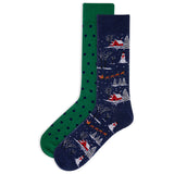 A pair of men's Christmas-themed crew socks with a pattern featuring Santa Claus, reindeer, and snowmen on a navy background, and a solid green pair with polka dots.