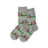 A pair of heather gray crew socks featuring a repeating pattern of pink golf carts on green putting greens with small golf balls and flags.