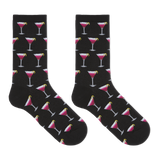 A pair of black crew socks with an all-over repeating pattern of pink and white cocktail glasses on a clean white background.