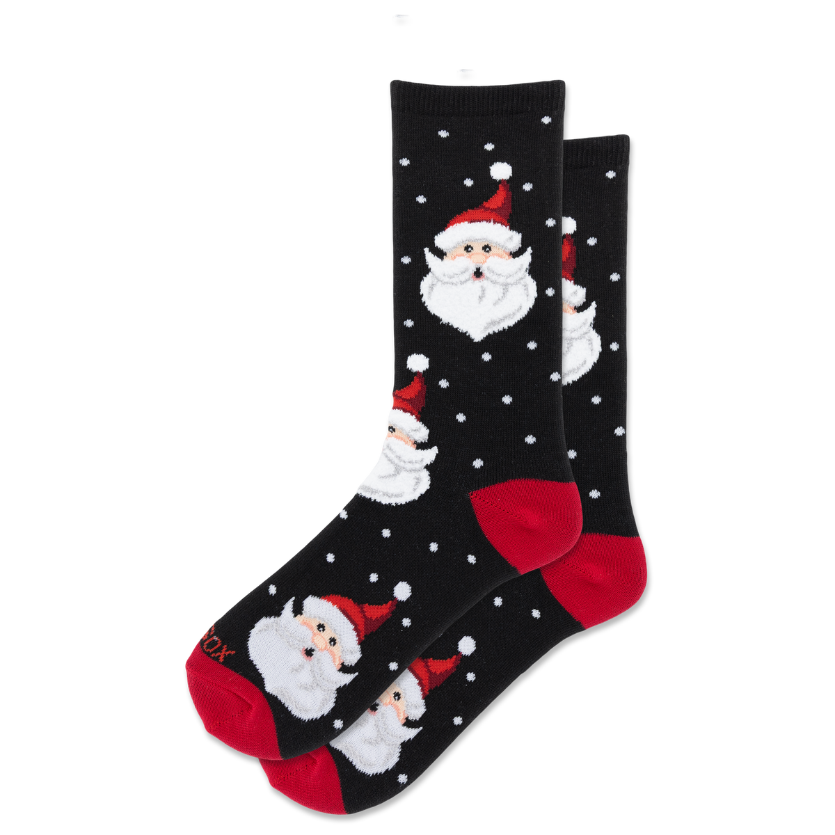 A pair of black crew socks with a festive Christmas pattern featuring Santa Claus faces, red heels and toes, and white polka dots, displayed on a clean white background.
