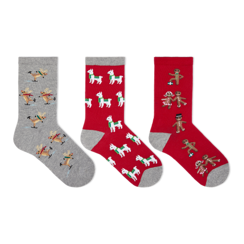 Three Christmas-themed crew socks displayed side-by-side on a plain white background. The left sock is heather gray with a pattern of skating reindeer.