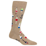 A single crew sock in heather tan with a playful pattern of nautical buoys, anchors, and boats in red, blue, green, and white, shown on a plain white background.