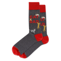 A pair of crew socks in dark heather gray with bright red cuffs, heels, and toes. The main body features the words 'CAT DAD' in red, alongside several cartoon cats in gray, white, and yellow.