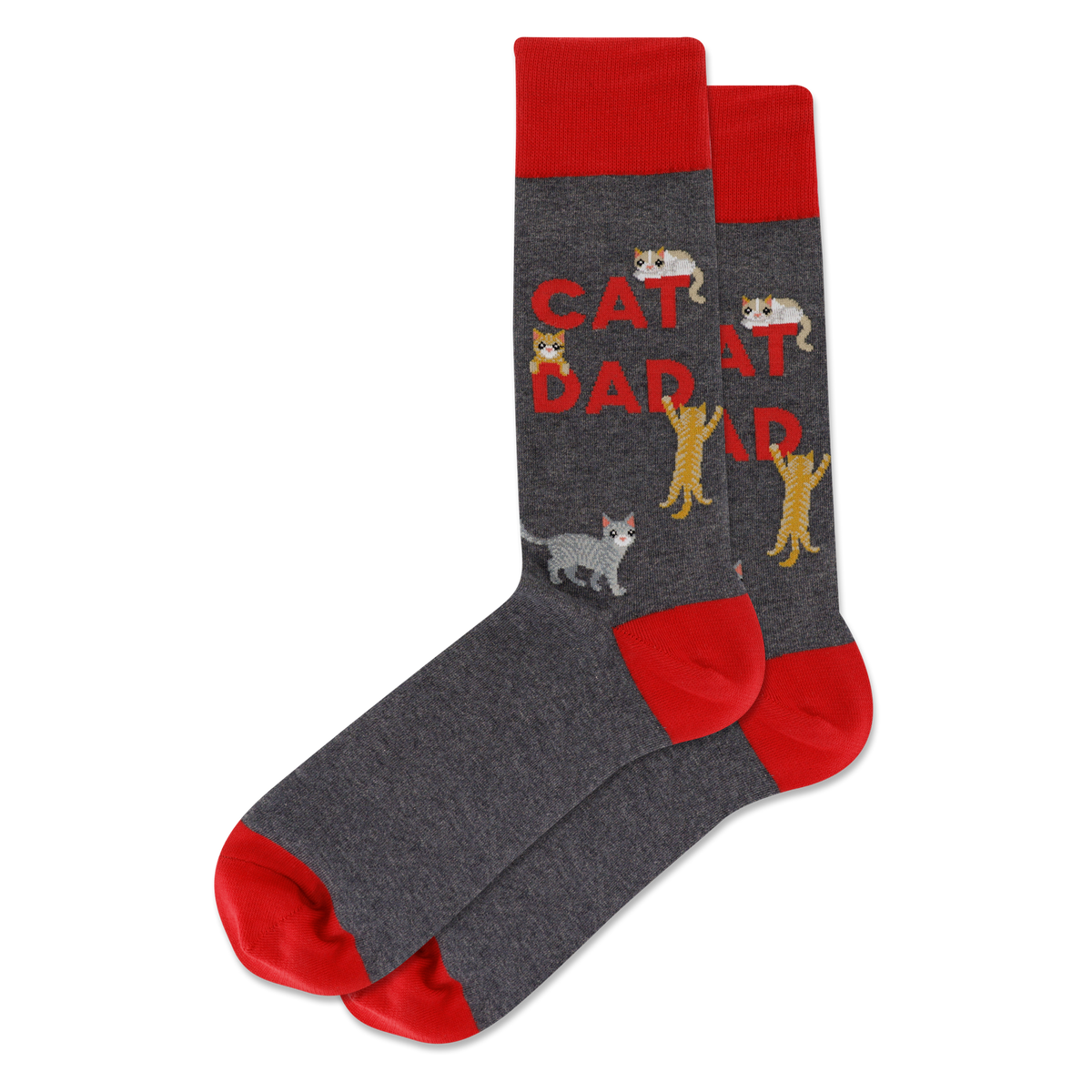 A pair of crew socks in dark heather gray with bright red cuffs, heels, and toes. The main body features the words 'CAT DAD' in red, alongside several cartoon cats in gray, white, and yellow.