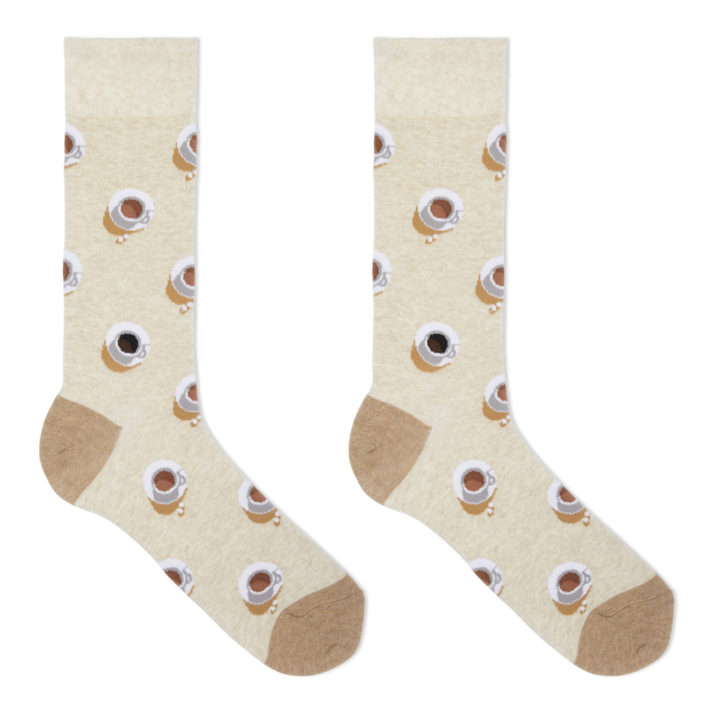 A pair of beige crew socks with a repeating pattern of coffee cups and saucers, featuring solid tan heels, toes, and cuffs, displayed on a clean white background.