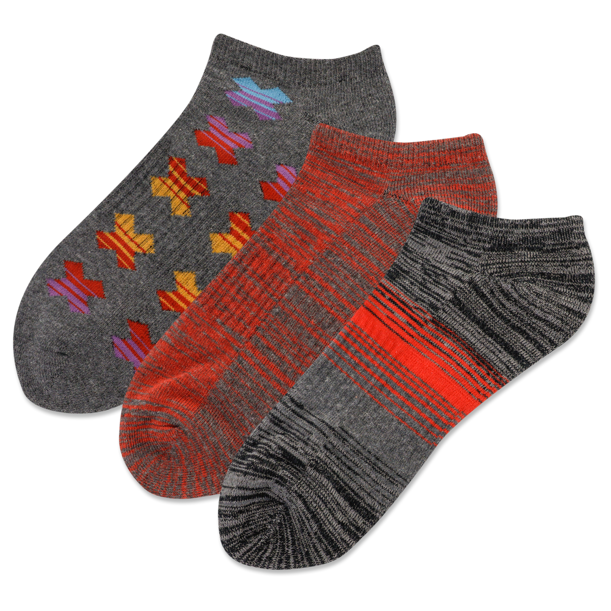 Three pairs of socks with different patterns on a white background