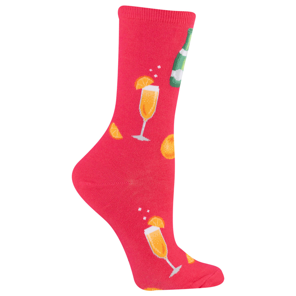 A single bright pink crew sock with a repeating pattern of champagne glasses, orange slices, and a green bottle on a white background.