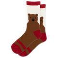 A pair of crew socks featuring a knitted brown bear face on a white background with red cuffs, heels, and toes, shown against a plain white background.