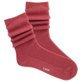 Red ribbed women's slouch sock on a white background
