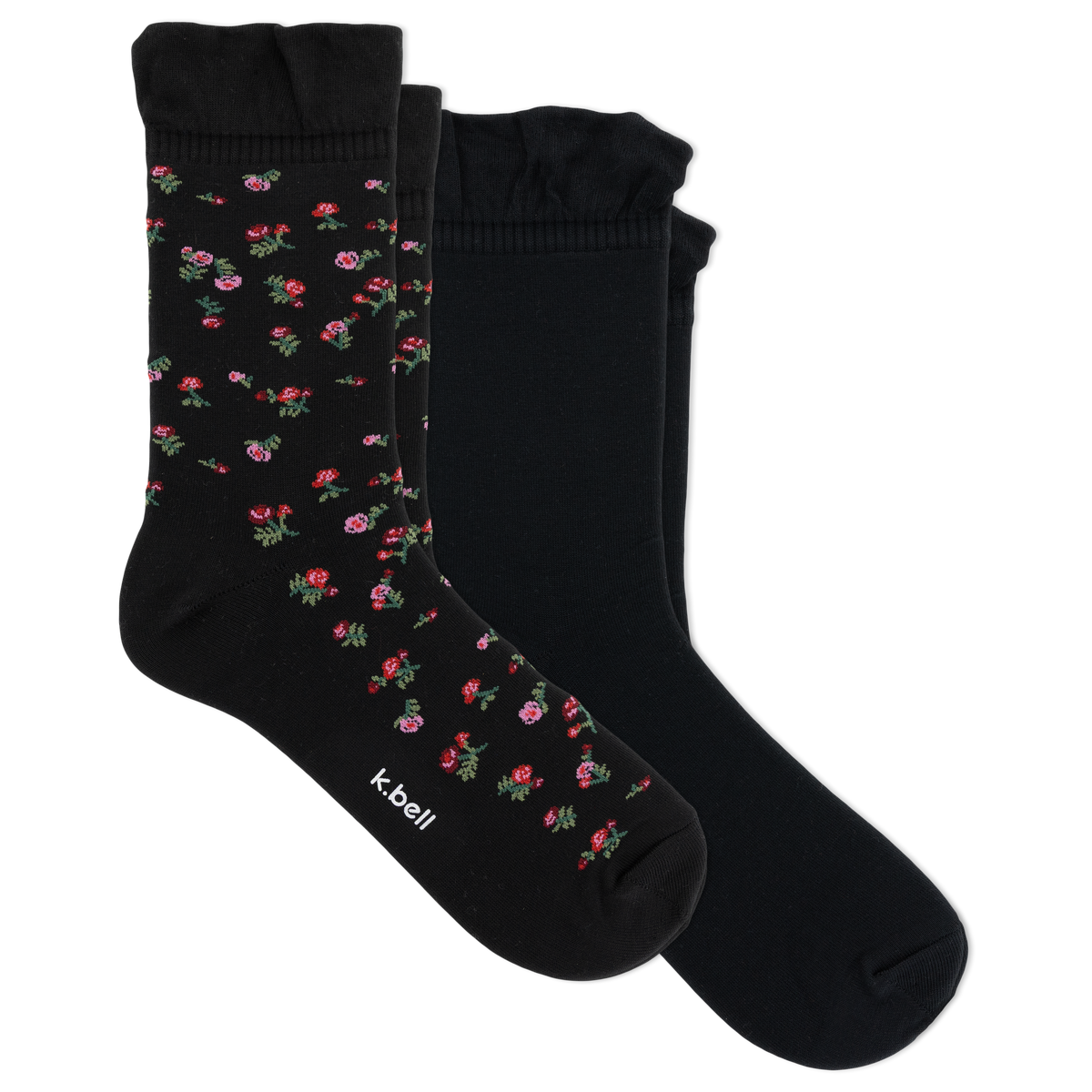 Two pairs of black crew socks with ruffled cuffs, one featuring a small pink and red floral pattern with green leaves, and the other solid black. The brand name 'it bell' is printed on the toe of the patterned sock.