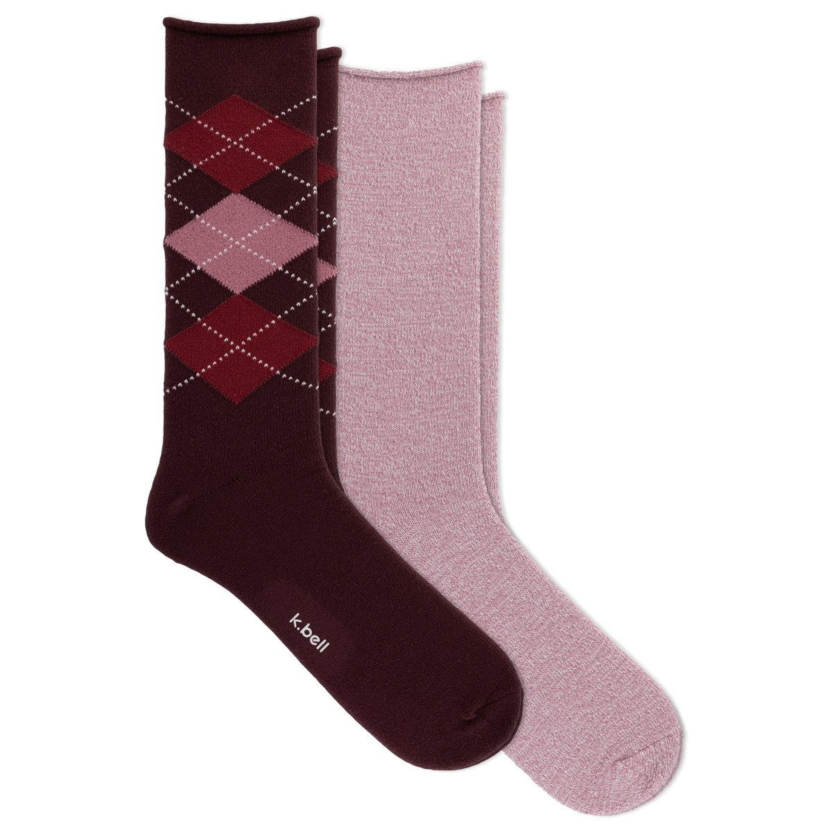 Two pairs of crew socks arranged overlapping on a white background: one dark burgundy pair with an argyle diamond pattern in red and pink and one heathered dusty pink pair. The burgundy sock has the brand name 'k.bell' printed near the foot.