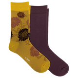 Two pairs of crew socks from K-Bell: one pair is solid dark plum purple, and the other pair is metallic gold with a floral pattern in brown and black. The yellow pair has the K-Bell brand name printed near the toe. thumbnail