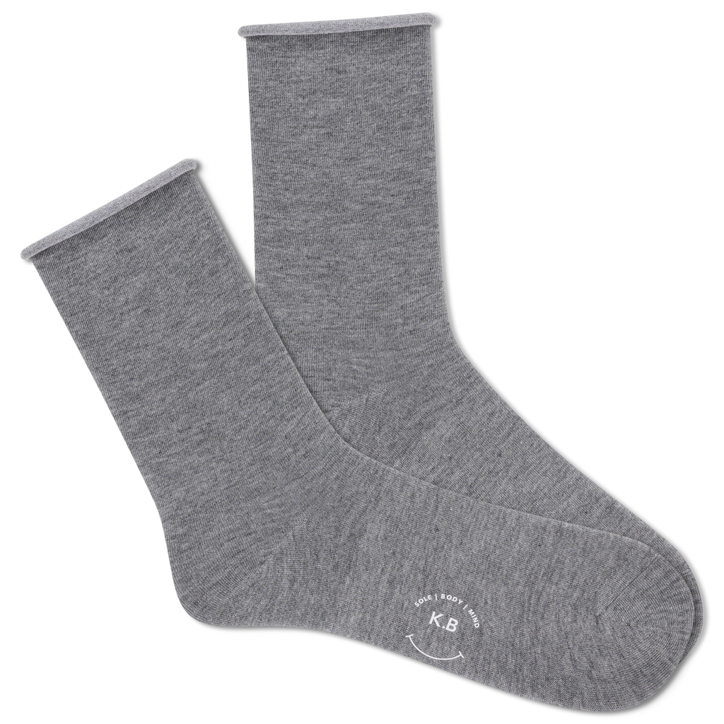 Pair of gray socks with a brand logo on a white background