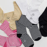 K.Bell striped and solid microfiber crew socks in various colors and patterns on a white background