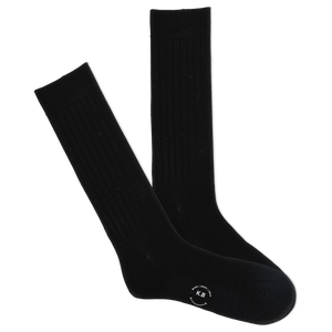 A pair of black ribbed crew socks with a visible K.Bell brand logo on the sole.