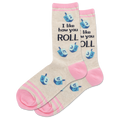 Beige socks with pink accents and blue dreidel designs, featuring text on a white background.