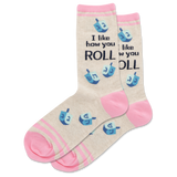 Beige socks with pink accents and blue dreidel designs, featuring text on a white background.
