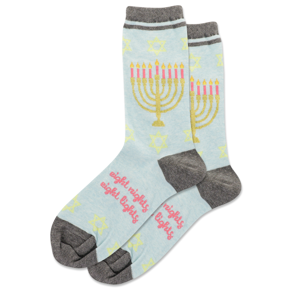 Light blue socks with Menorah design and 'eight nights' text on a white background