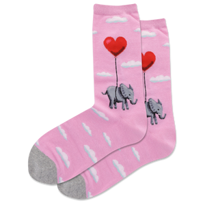 A pair of pink crew socks with a pattern of white clouds, an elephant, and a heart-shaped balloon.