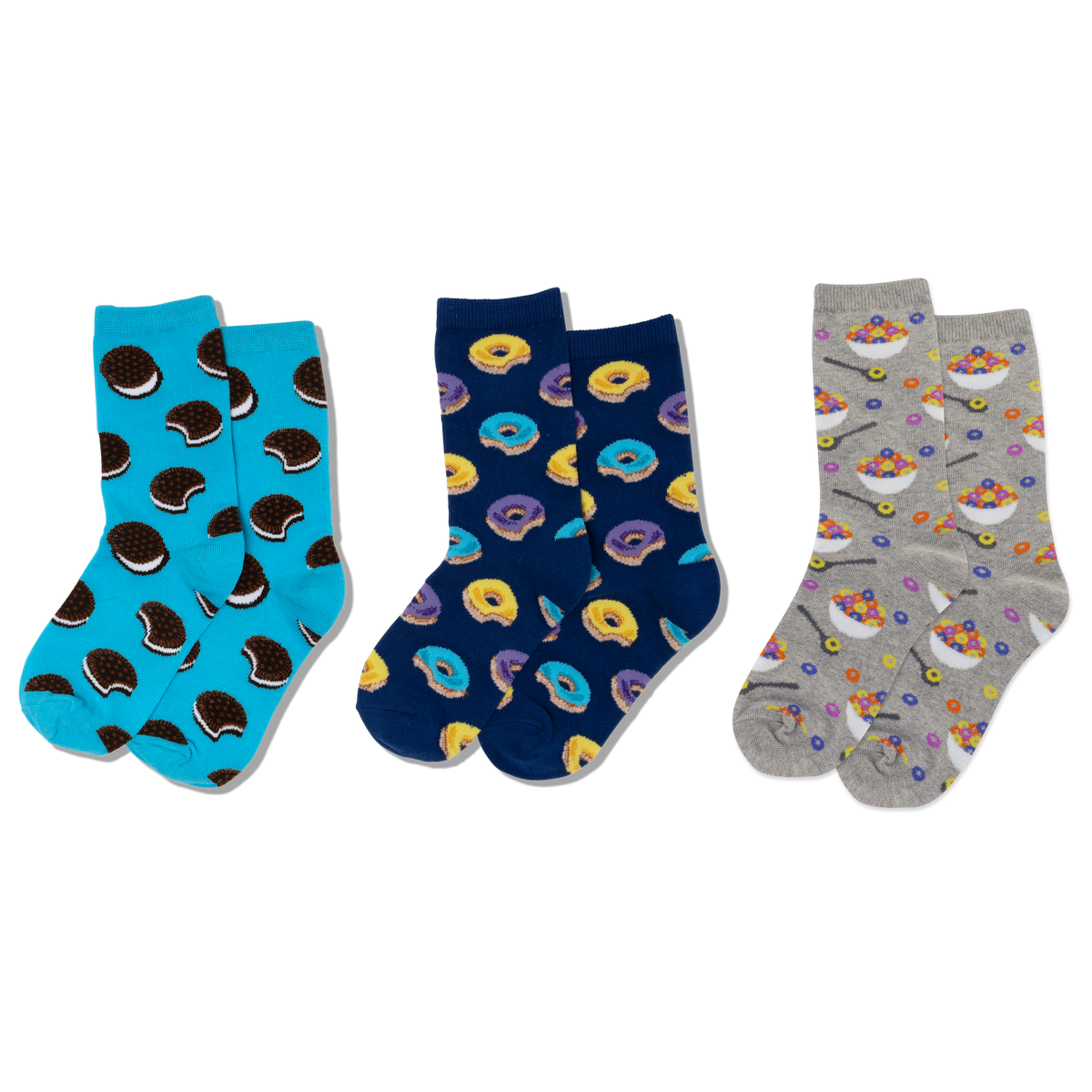 Three pairs of socks with different food patterns on a white background