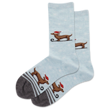 Light blue socks with dachshund dog illustrations on a white background