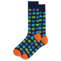 Navy sock with green and blue puzzle piece pattern and orange toes and heels on a white background