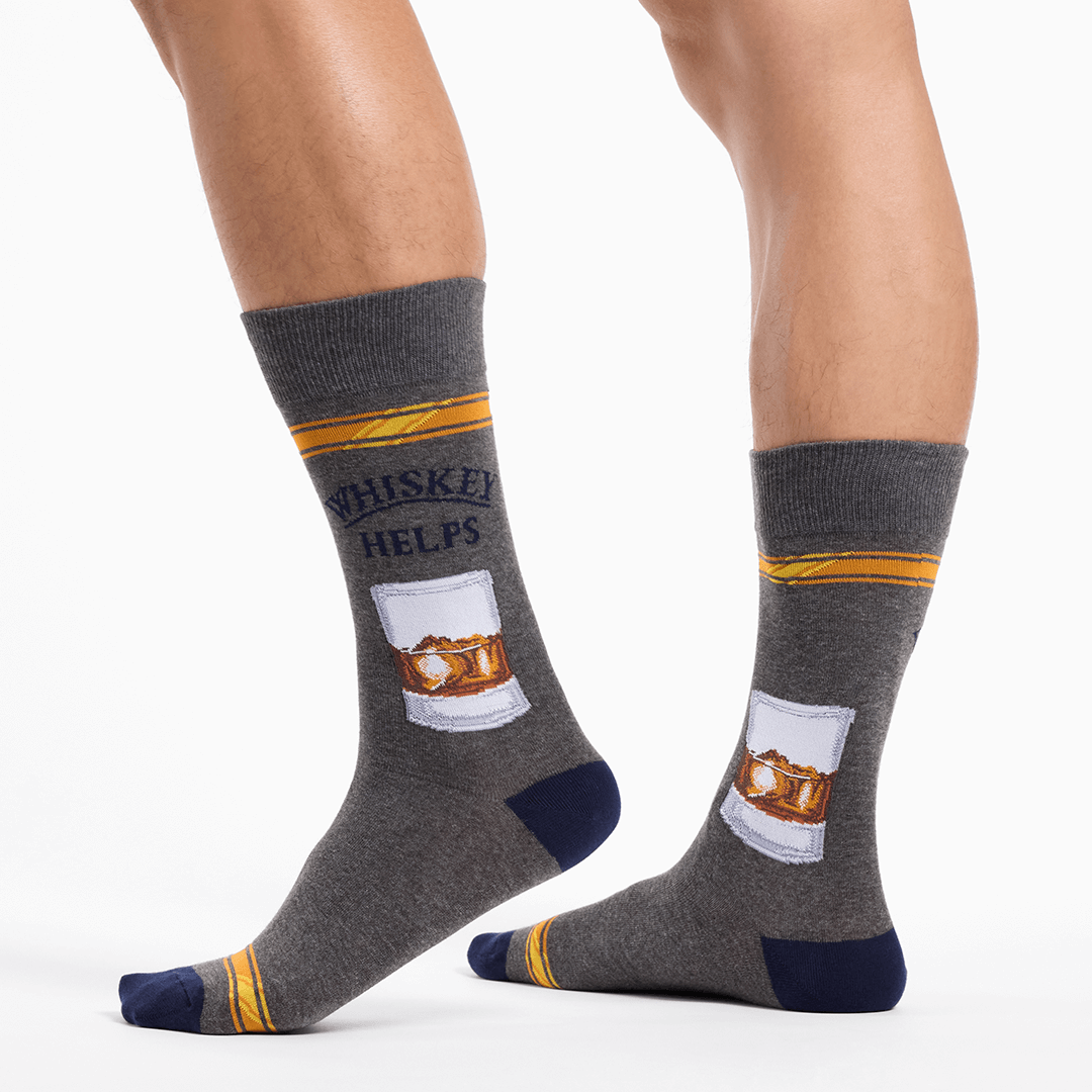 Gray socks with whiskey graphic and text on a white background