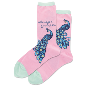 Pink socks with blue peacock designs and 'always sparkle' text on a white background