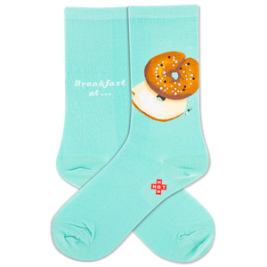 Turquoise socks with a bagel design and 'Breakfast at' text on a white background