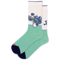 Green socks with floral design on a white background