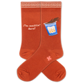 Orange socks with a spilling coffee cup  design and text on a white background