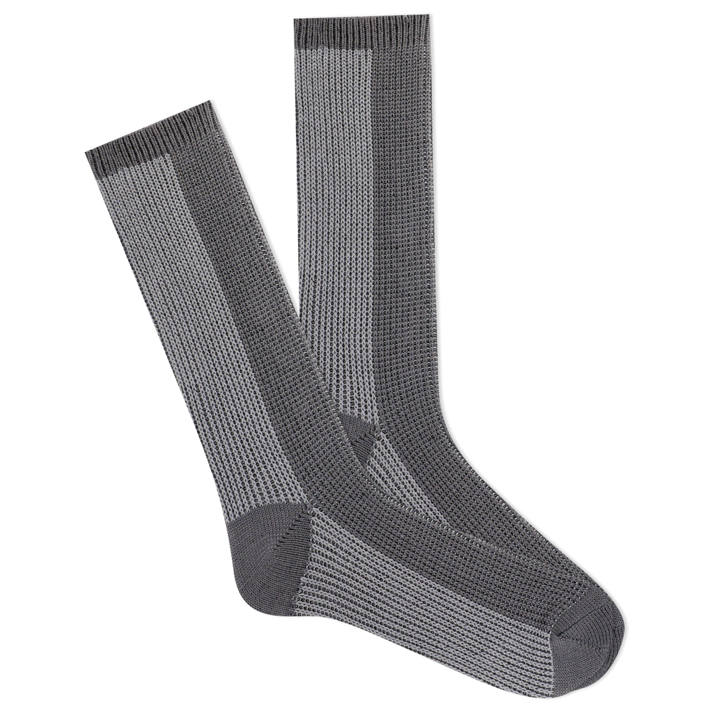 Pair of gray socks with a subtle pattern on a white background