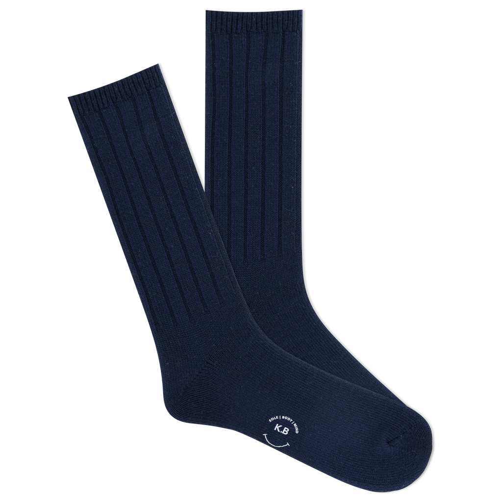 A pair of K.Bell men's classic ribbed crew socks in navy color, featuring a comfortable fit and wide ribbed design.