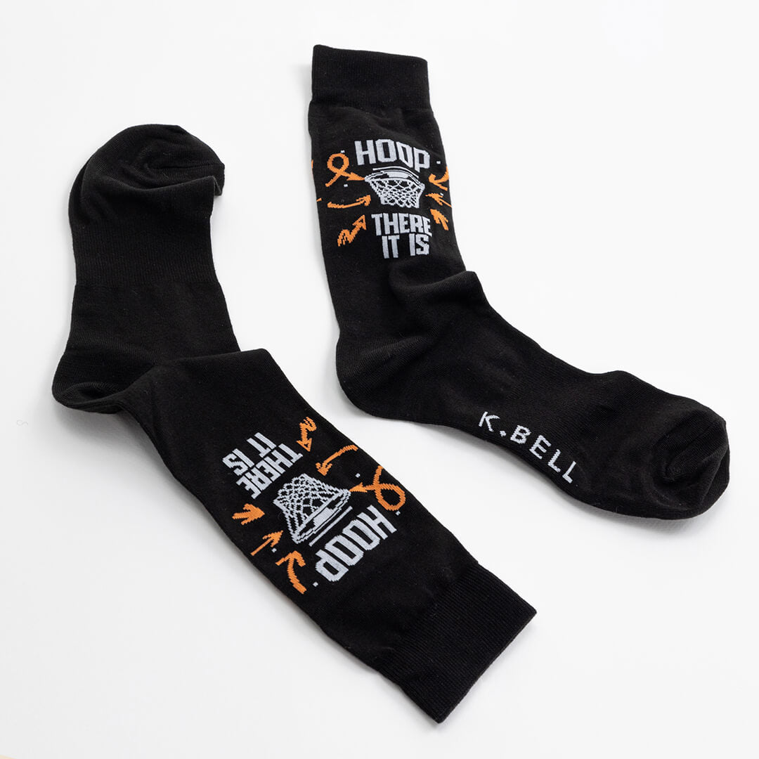 Black socks with text and graphics on a white background