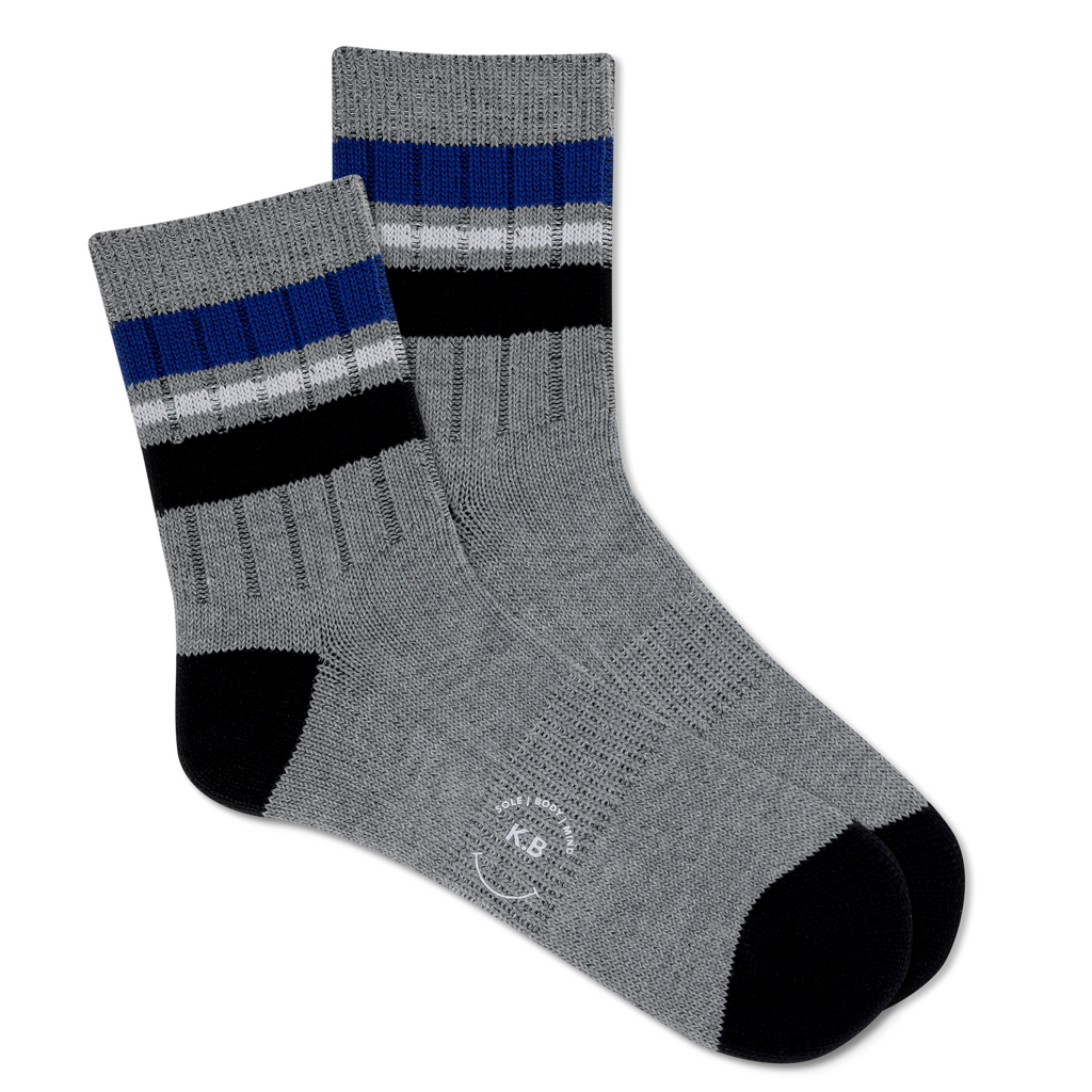 A pair of men's short crew socks with a striped pattern in gray, black, and blue colors.