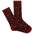 A pair of red boot crew socks with a leopard print pattern.