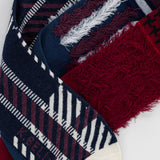 Collection of socks with different patterns and colors on a white background